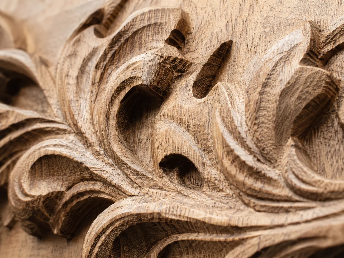 Close-up view of detailed carved wood relief